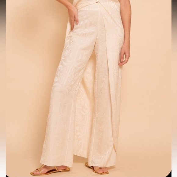 Journey Like No Other Jacquard
Draped Halter Top and Pants Set By Johanna Ortiz - Picture 11 of 12